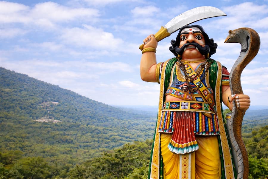 The Mahishasura statue at Chamundi Hills symbolizes the legend behind the origin of the name Mysore.